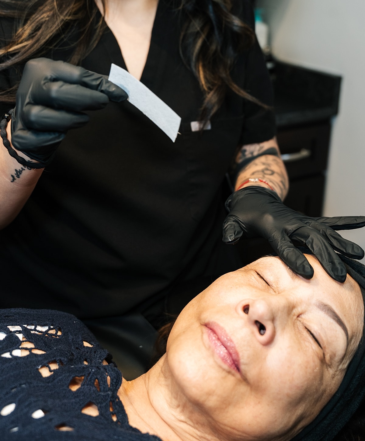 Client receiving Before and after Santa Fe waxing treatment.