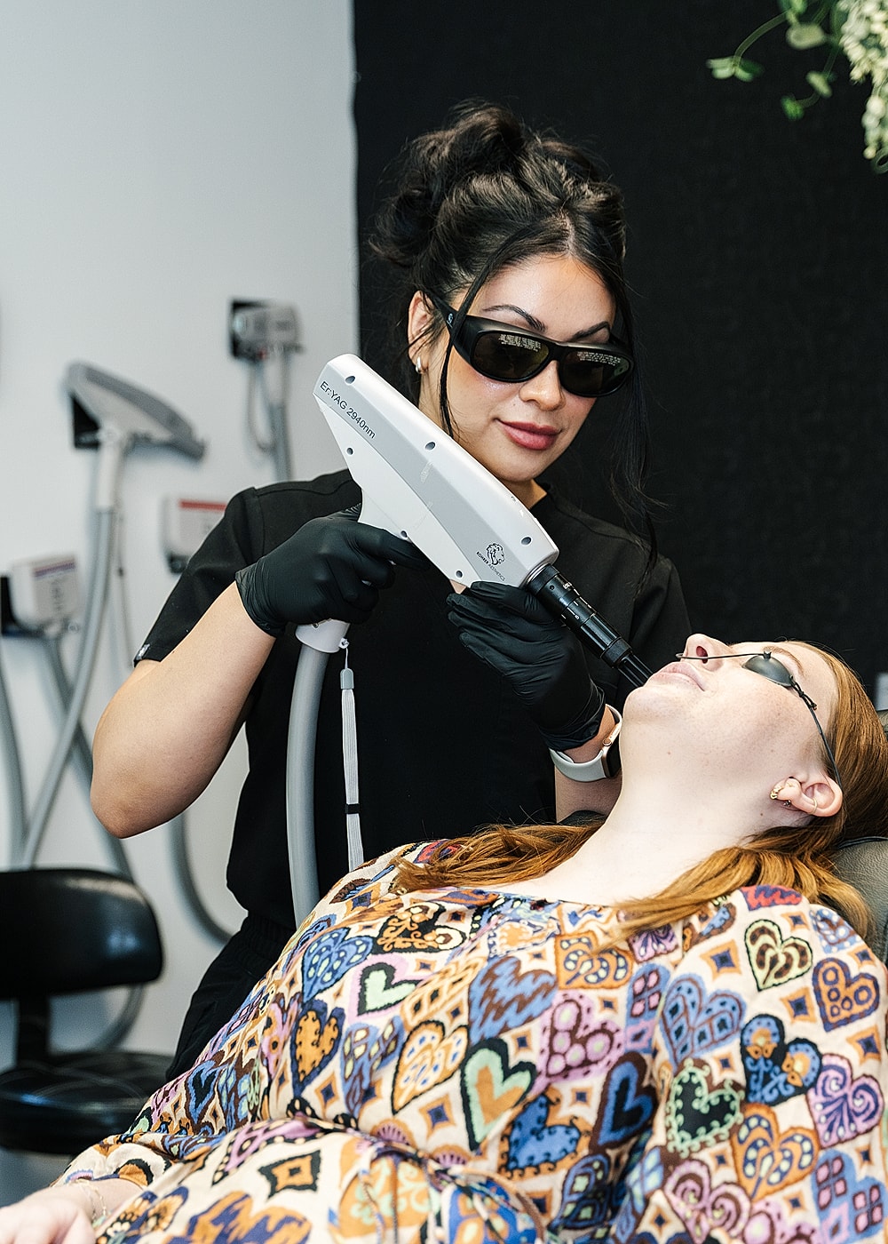 Laser treatment session in a skincare clinic.