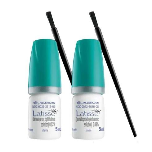 Latisse eyelash growth serum bottles and brush.