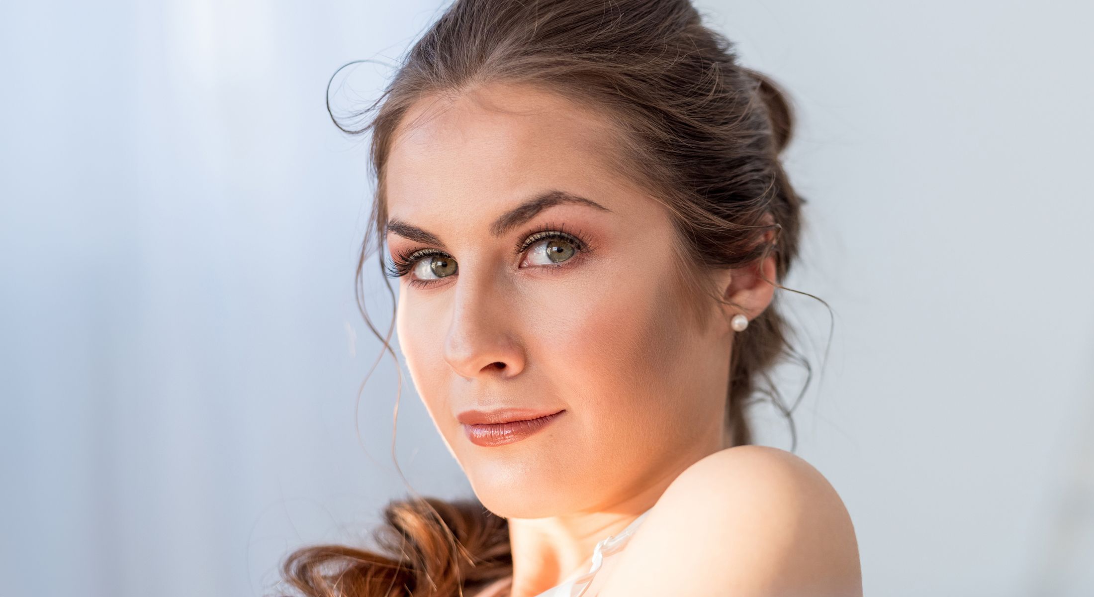 Portrait of a woman with subtle makeup.