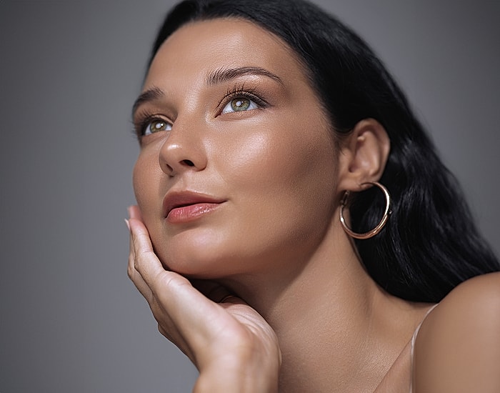 Portrait of a woman with long hair.