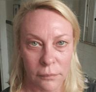 Person with blonde hair and green eyes.